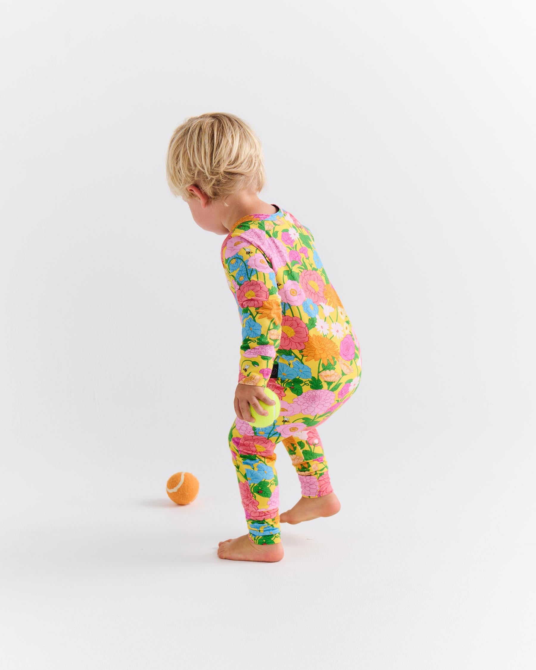 KIP & CO - ORGANIC COTTON LONG SLEEVE ZIP ROMPER - FOLLOW THE SUN YELLOW