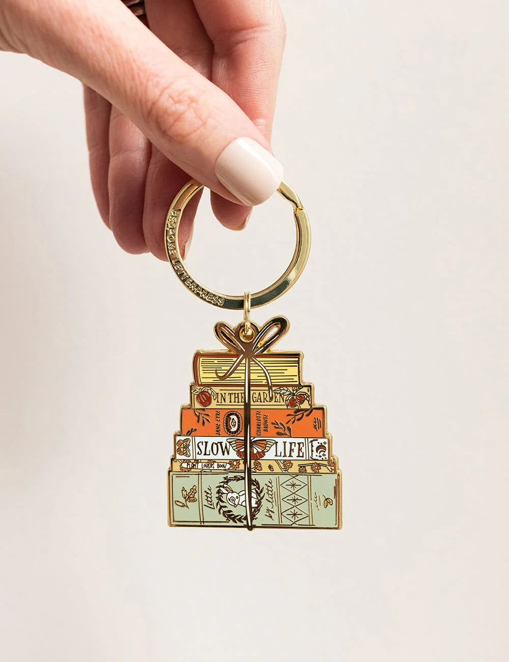 BESPOKE LETTERPRESS - ENAMEL KEYRING - BOOK STACK